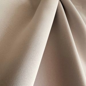Verduisterend beige brandvertragend gordijn